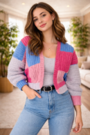 Colorful patchwork crochet cardigan made with crochet squares worn by a woman, handmade crochet sweater pattern tutorial.